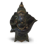 Ganesh zittend in schelp, speciale masala finish