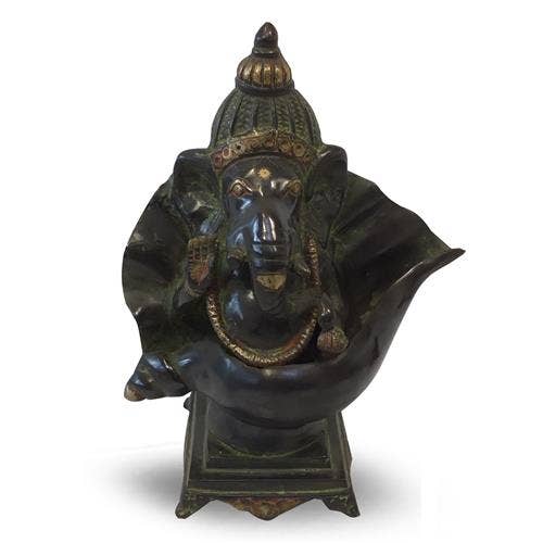 Ganesh zittend in schelp, speciale masala finish